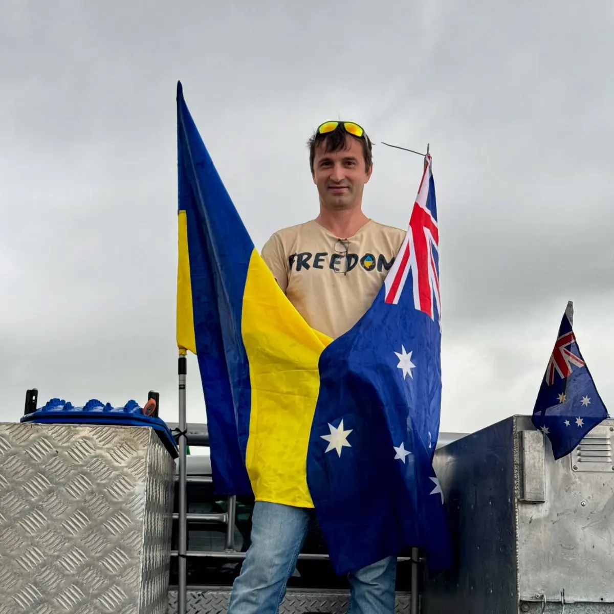UAANT member holding the Australian and Ukrainian flags