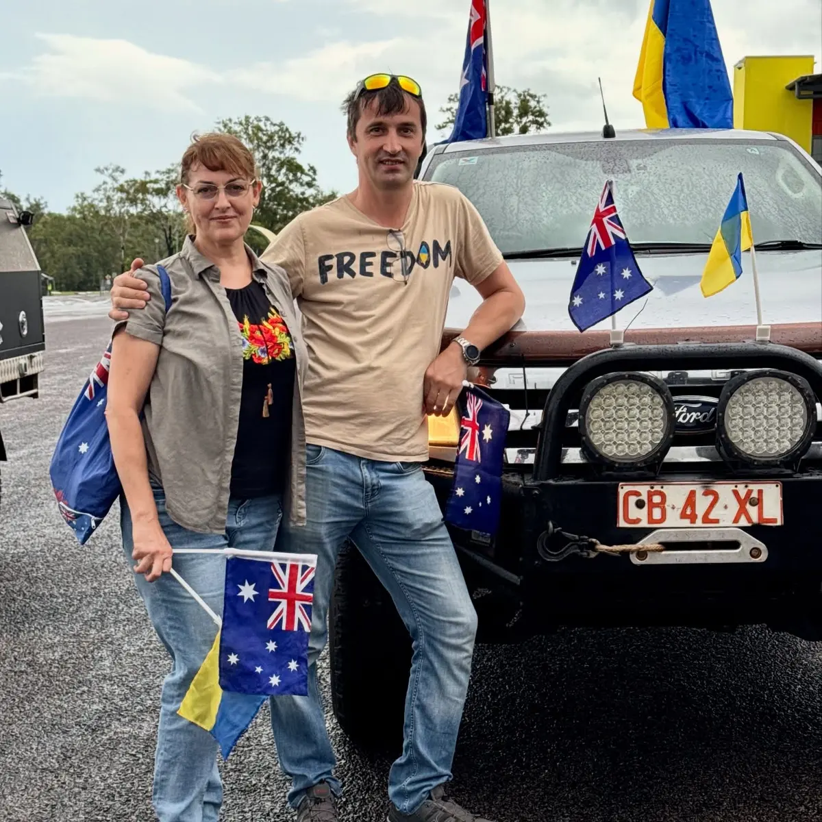 UAANT members beside a ute decorated for Australia Day